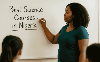 Photo of a Nigerian Curvy Female Teacher Writing: “Best Science Courses in Nigeria” On the Board