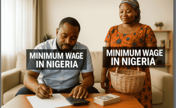 Photo of a man and his wife calculating how the Nigerian minimum wage will sustain them this month.